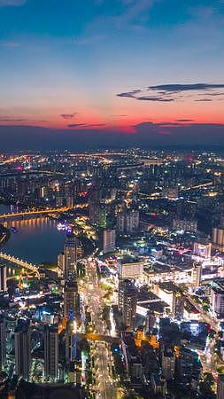 高清竖屏航拍城市晚霞夜景视频的预览图