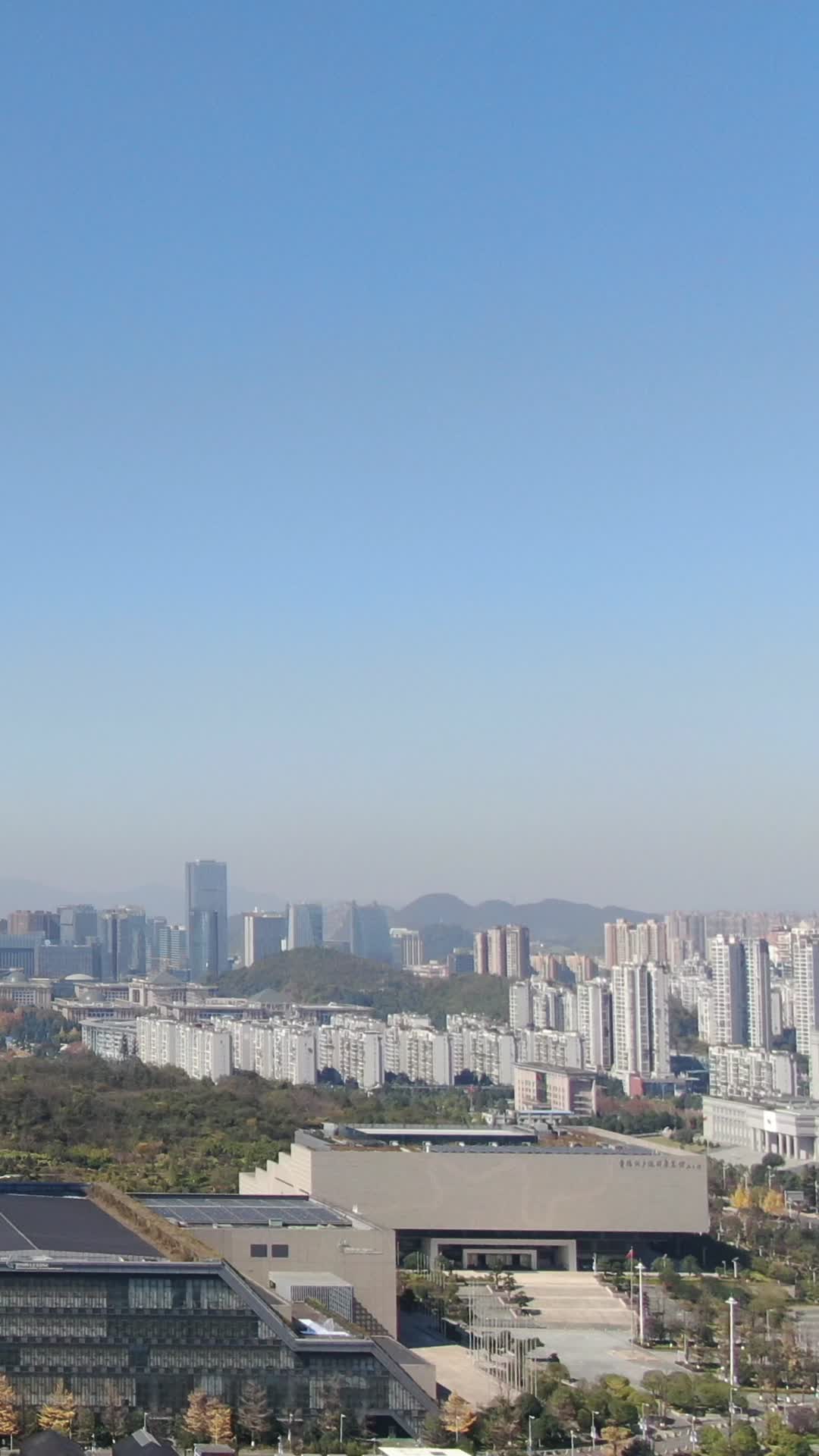 航拍贵州贵阳观山湖区城市竖屏视频视频的预览图