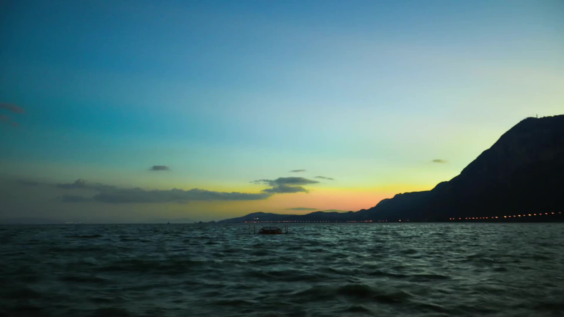 云南昆明滇池海埂公园晚霞夕阳延时视频的预览图