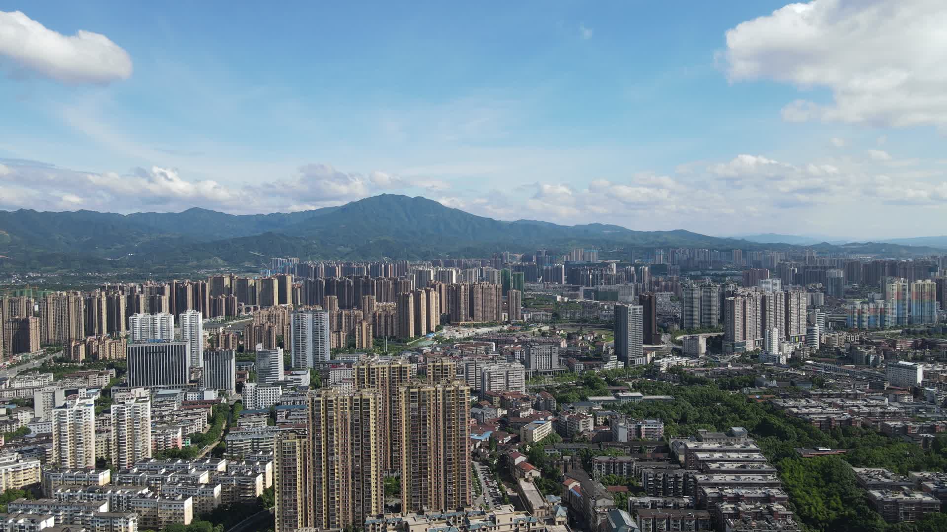 航拍湖南湘西城市建设蓝天白云视频的预览图