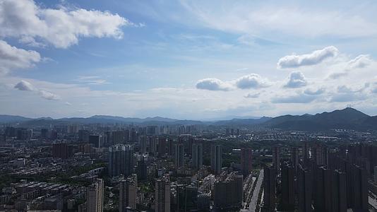 航拍城市高楼蓝天白云视频的预览图
