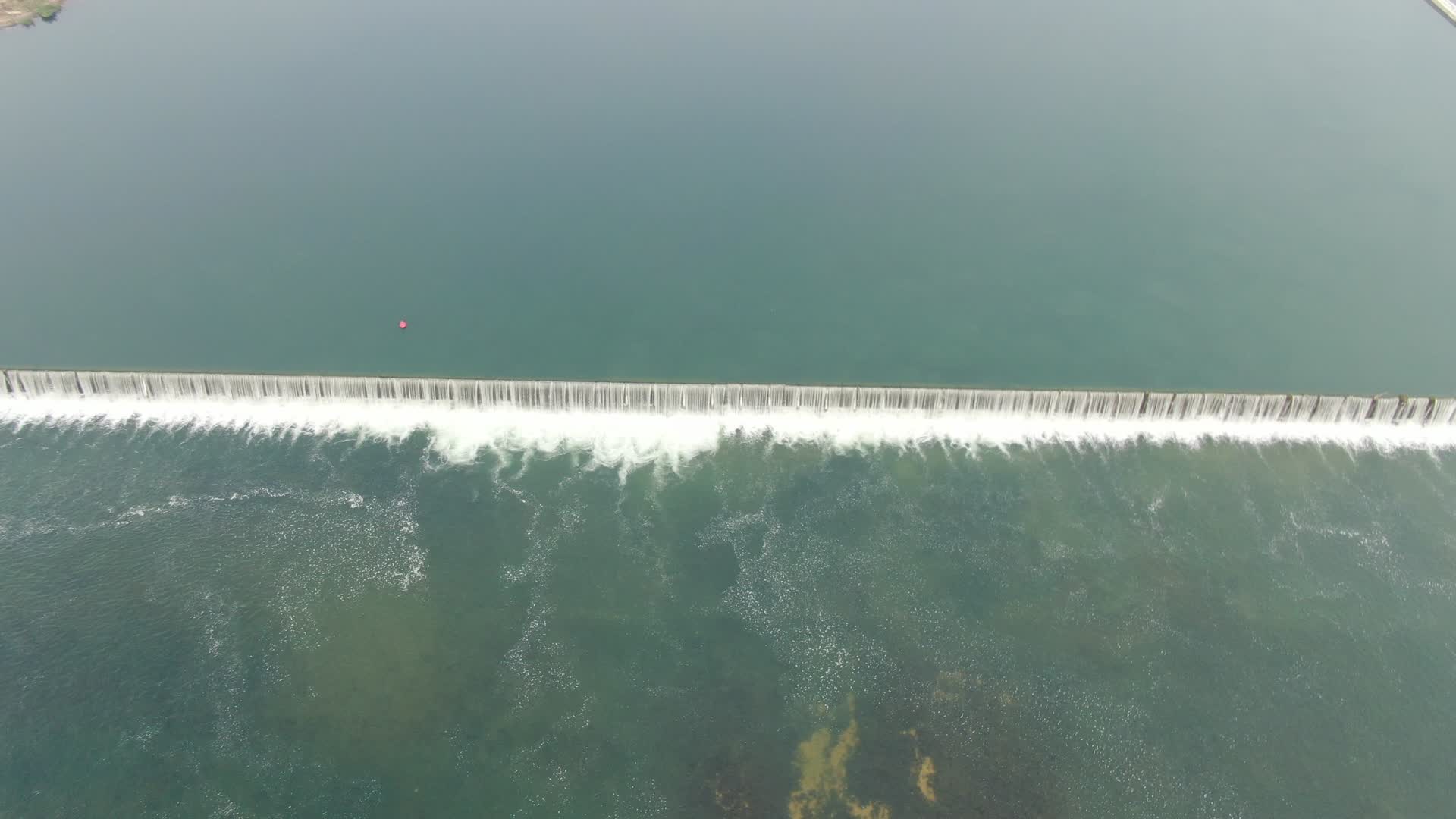 航拍湘西凤凰沱江流水瀑布视频的预览图