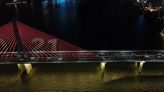 航拍湖南长沙湘江银盆岭大桥夜景灯光秀视频的预览图