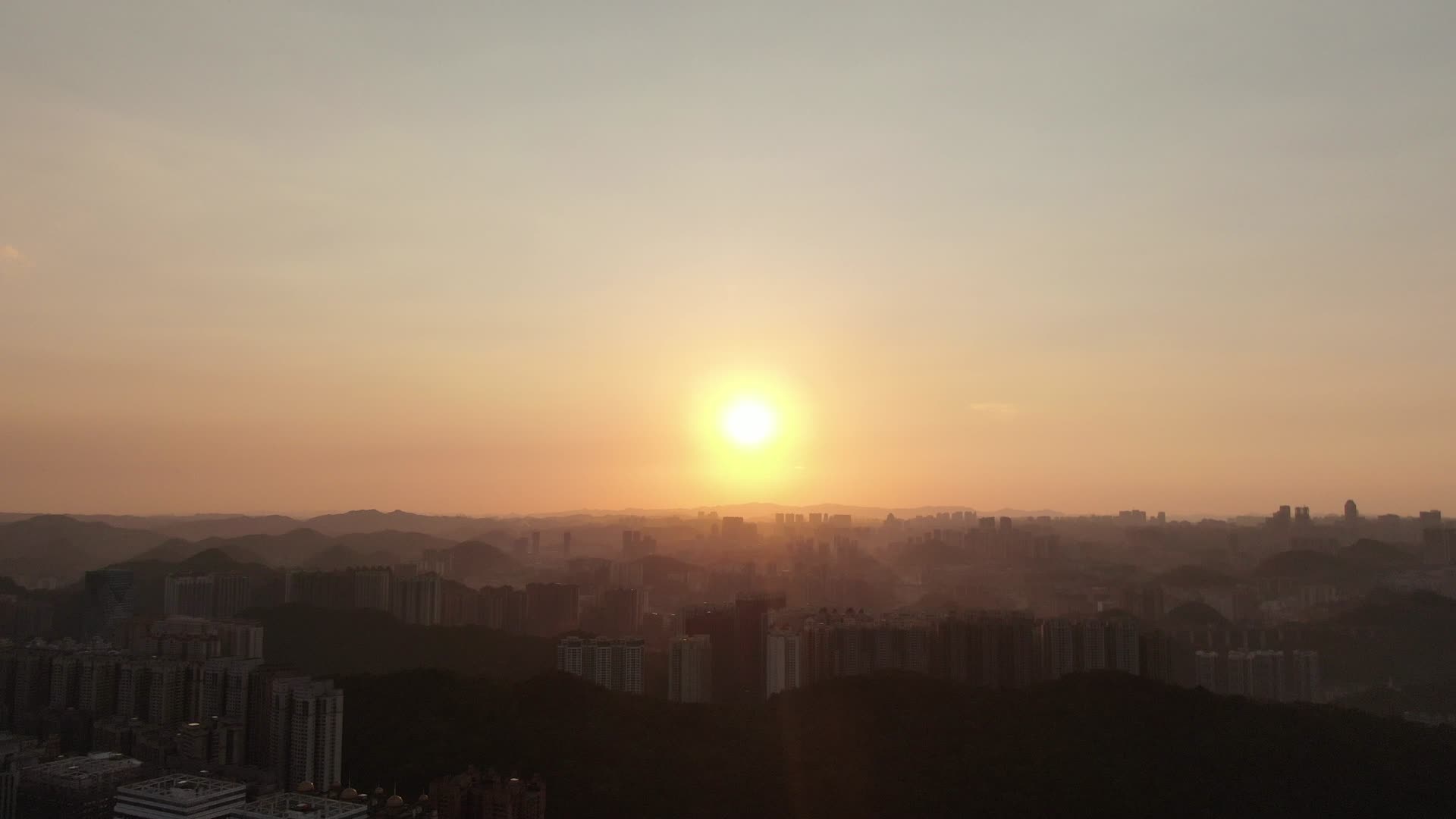 城市夕阳日落晚霞剪影航拍视频视频的预览图