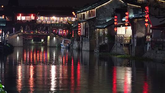 西塘古镇夜景古桥游船实拍视频的预览图