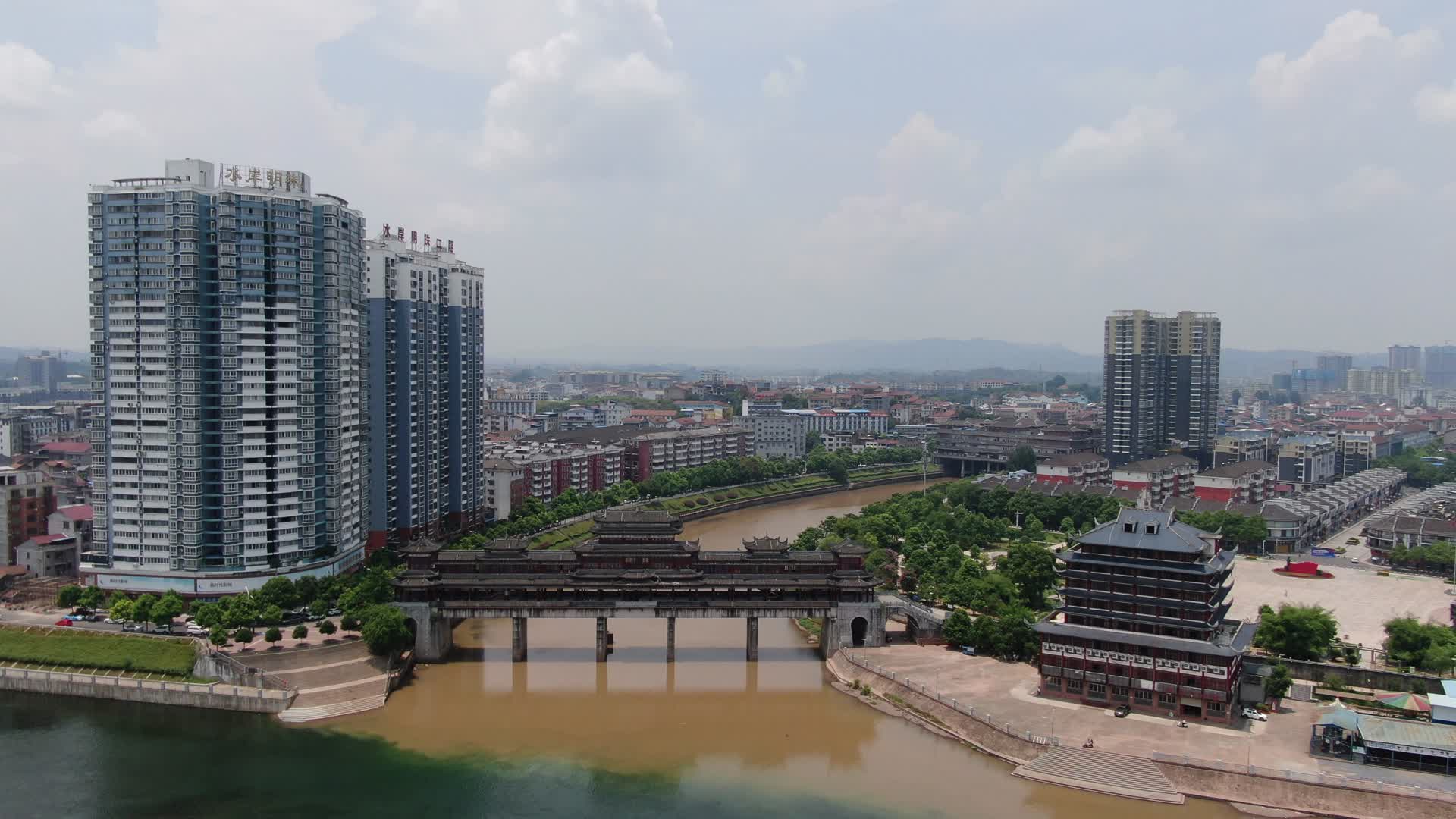 少数民族特色建筑风雨桥航拍视频视频的预览图