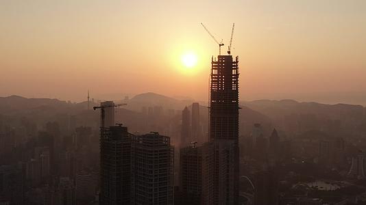 贵州城市高楼城市日出彩霞航拍视频的预览图