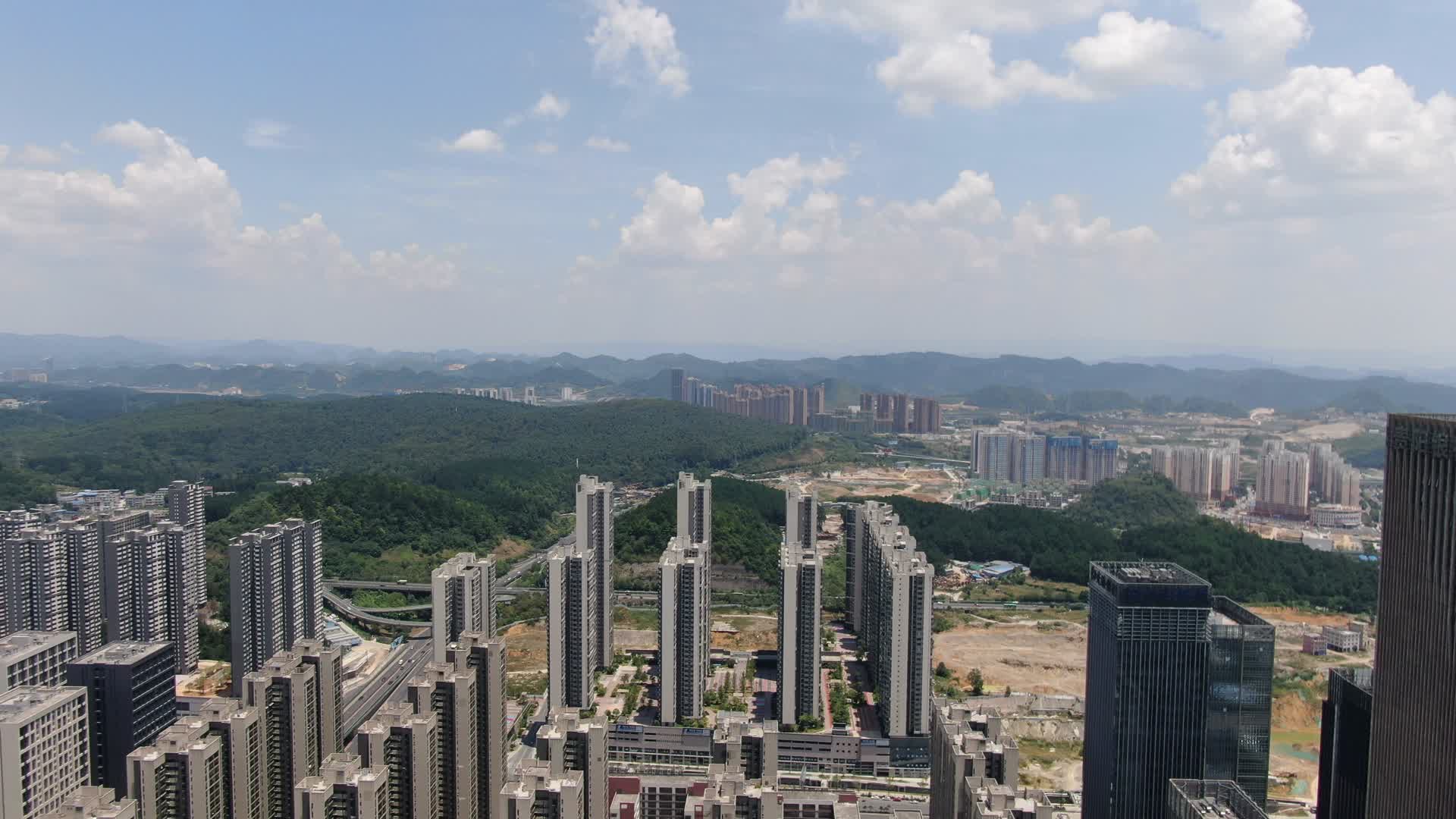 航拍城市高层住宅商业小区视频的预览图