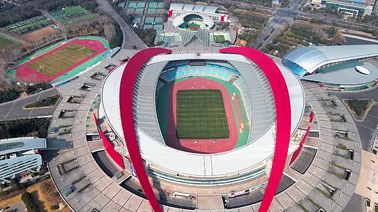 4K航拍南京市地标建筑奥体中心体育馆视频的预览图