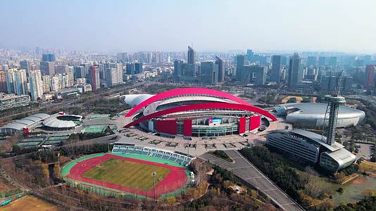 4K航拍南京市地标建筑奥体中心体育馆视频的预览图