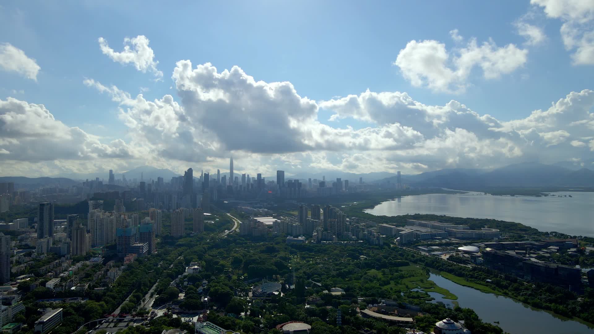 深圳南山区华侨城总部大厦城市风光4K航拍视频的预览图