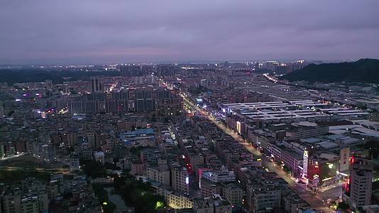航拍广东广州花都区傍晚城市风景视频的预览图