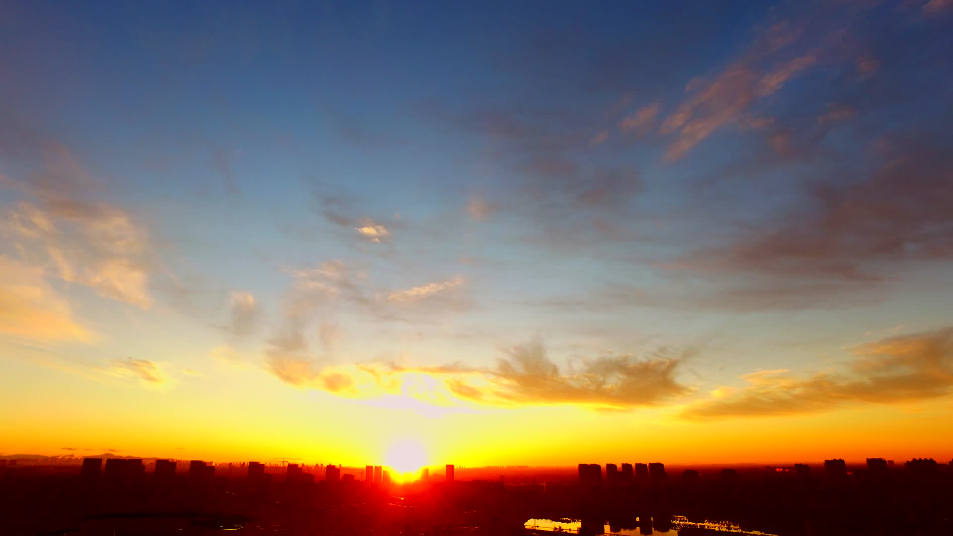 日出延时城市清晨早晨太阳城市早晨黎明视频的预览图