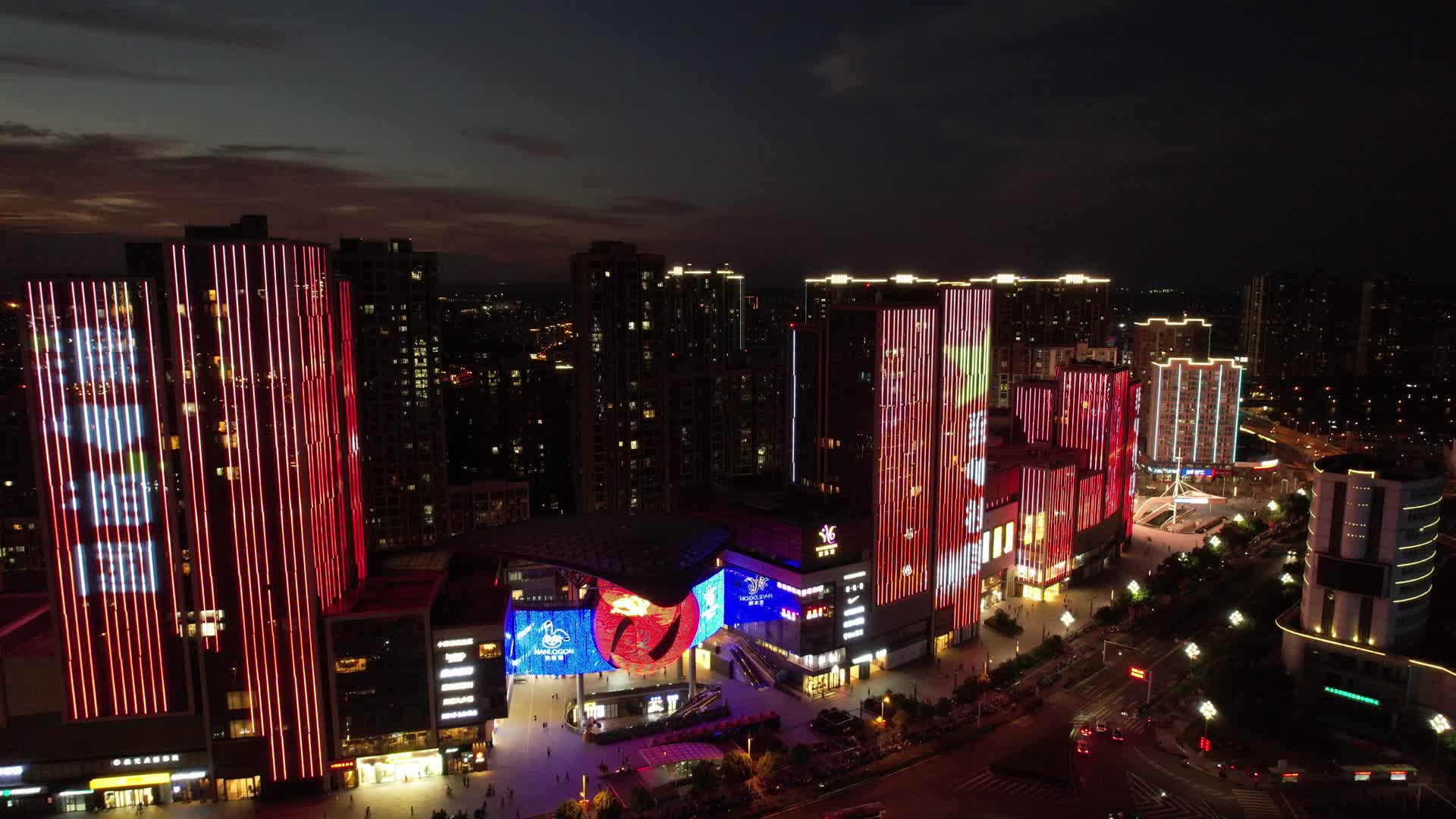 4K航拍南京城市地标六合欢乐港商业中心夜景视频的预览图
