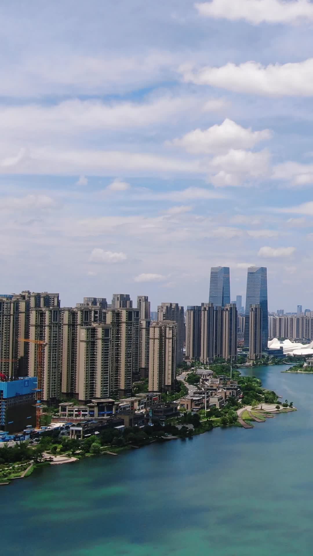 航拍城市超高层商业住宅小区竖屏视频视频的预览图