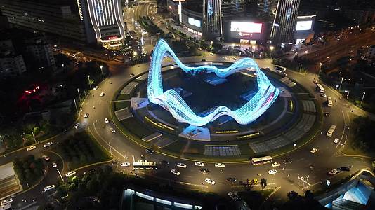 武汉地标光谷广场交通转盘交通夜景灯光航拍视频的预览图