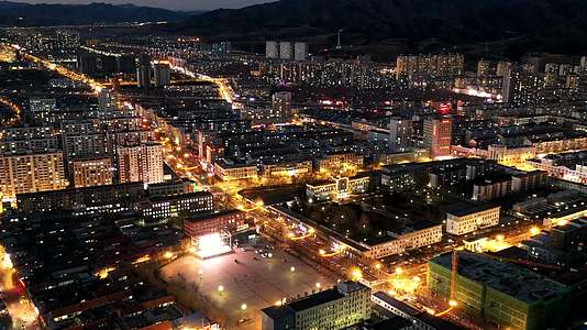 航拍丰宁县城夜景延时城市繁荣视频的预览图