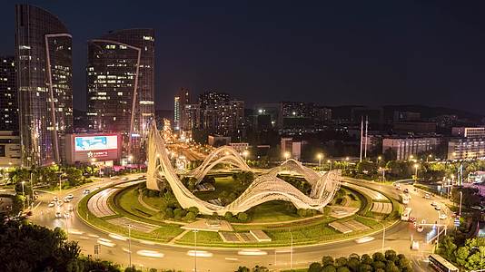 湖北武汉光谷广场地标建筑车流夜景4K航拍视频的预览图