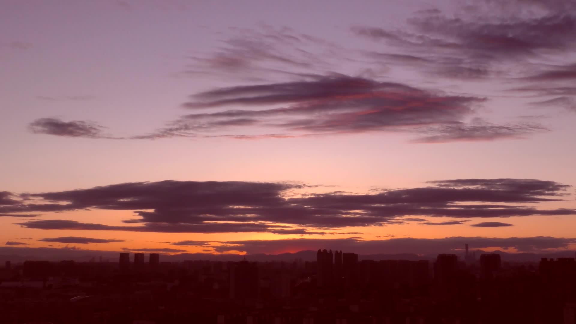 4K延时城市日出太阳升起来东方红太阳升早晨清晨视频的预览图