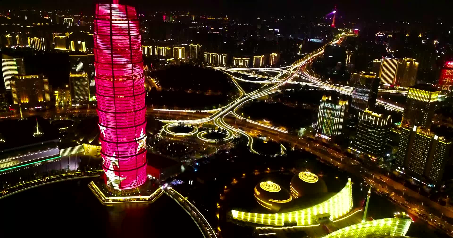 航拍郑州玉米楼CBD红色唯美灯光秀视频的预览图