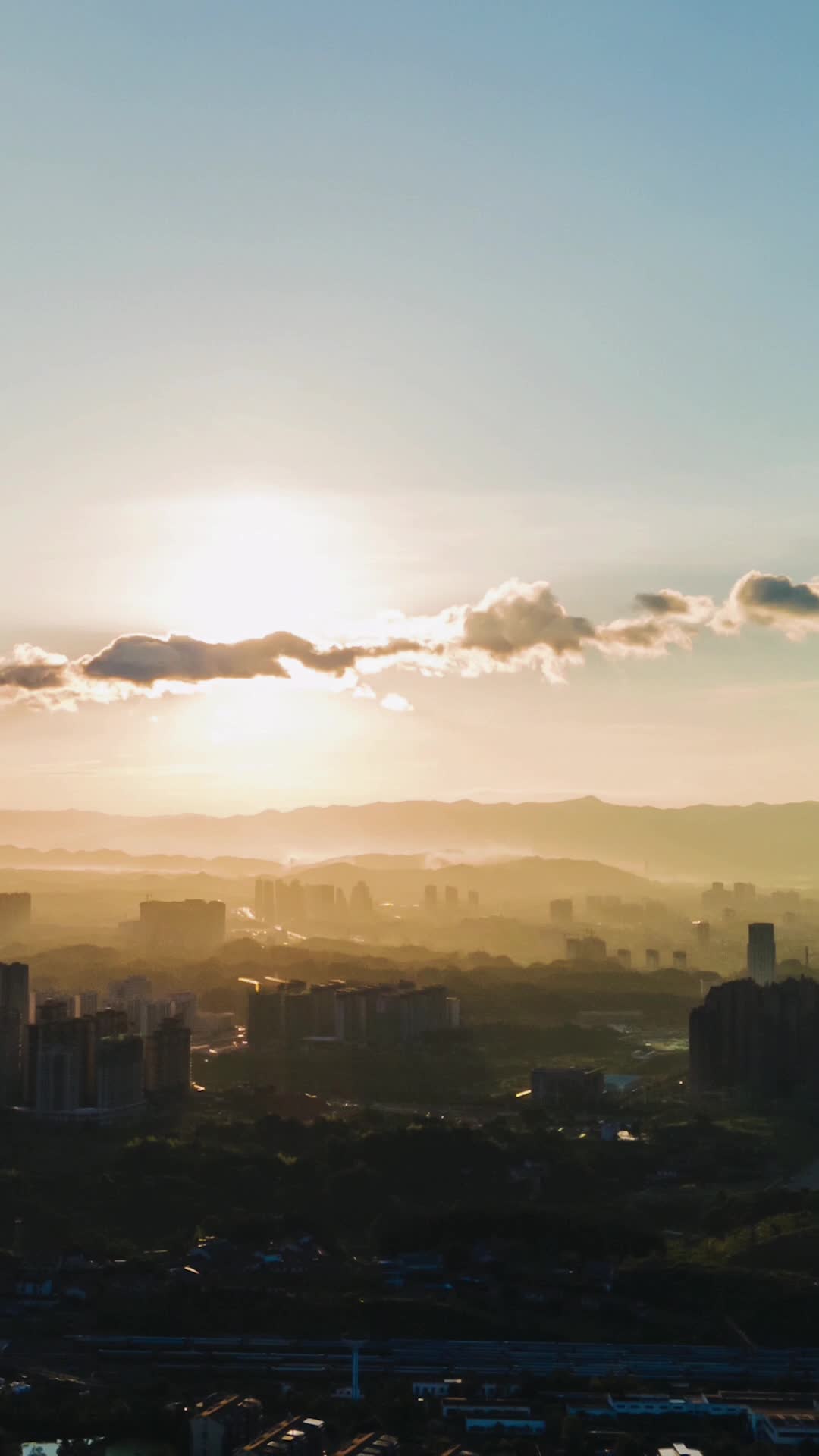 航拍城市夕阳延时摄影视频的预览图