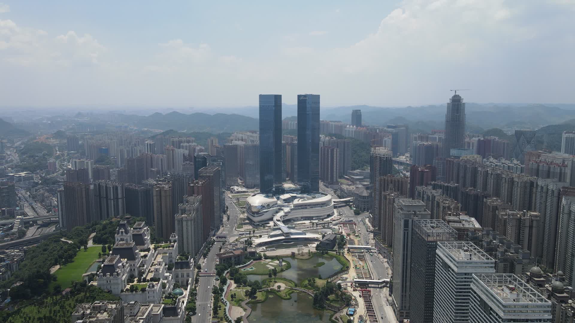 航拍贵州贵阳花果园双子塔地标建筑视频的预览图