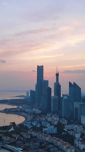 航拍山东青岛城市日落晚霞竖屏视频的预览图