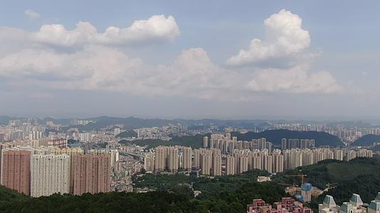 航拍贵阳城市全景蓝天白云视频的预览图