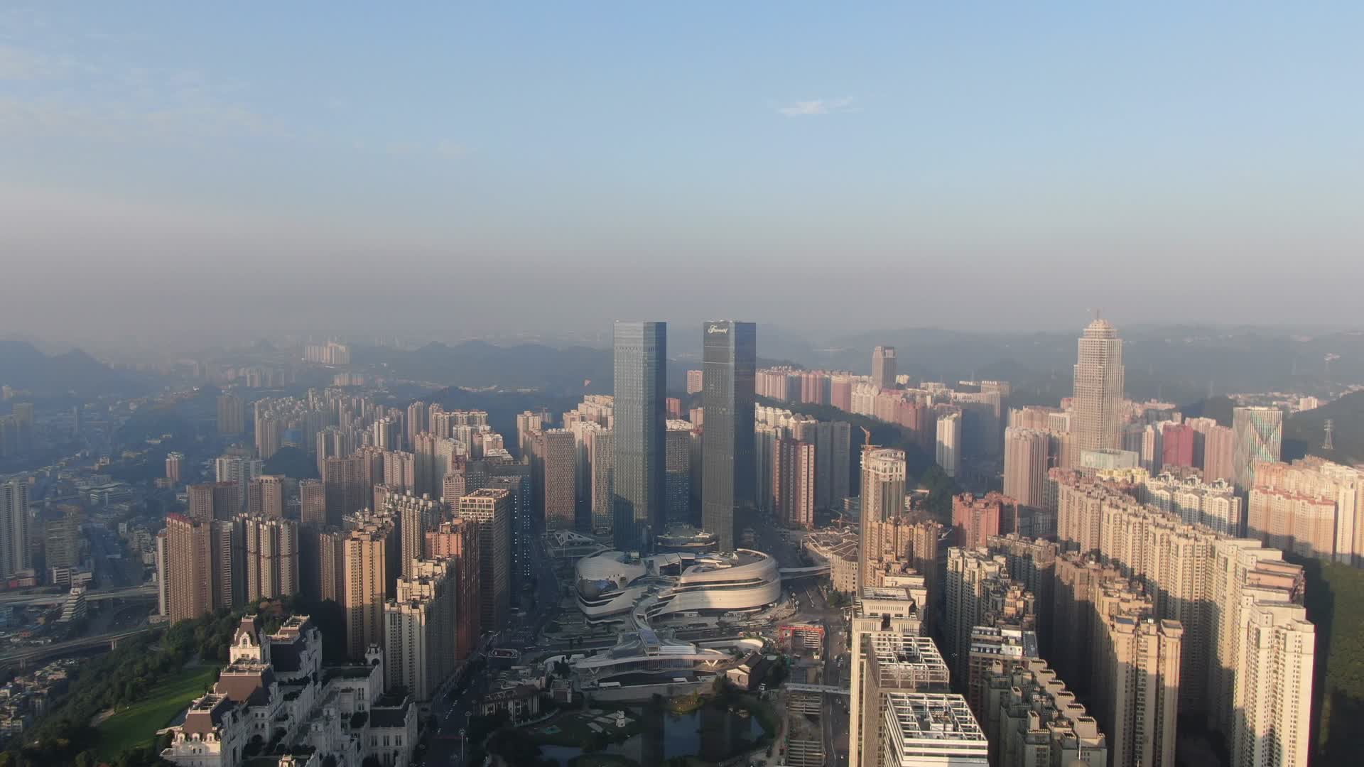 4K航拍贵州贵阳花果园双子塔地标建筑视频的预览图