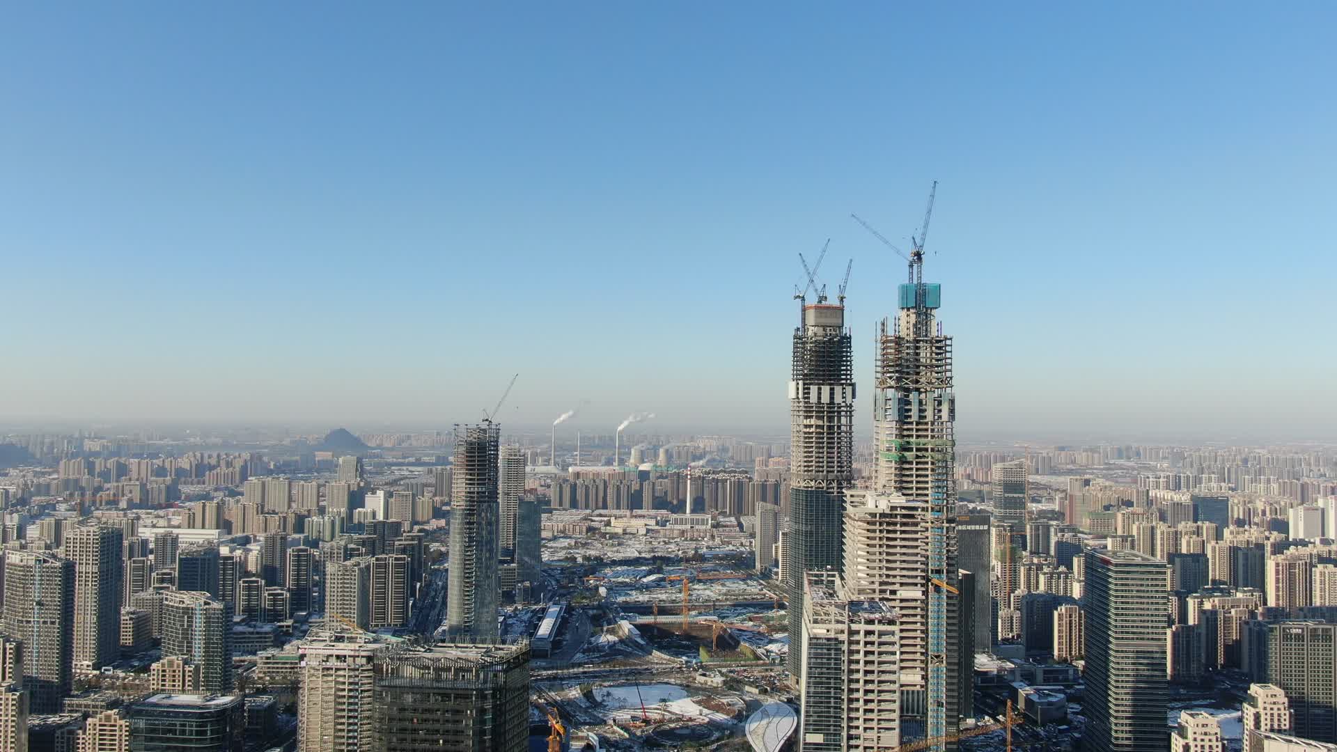航拍山东济南城市在建商务大厦视频的预览图