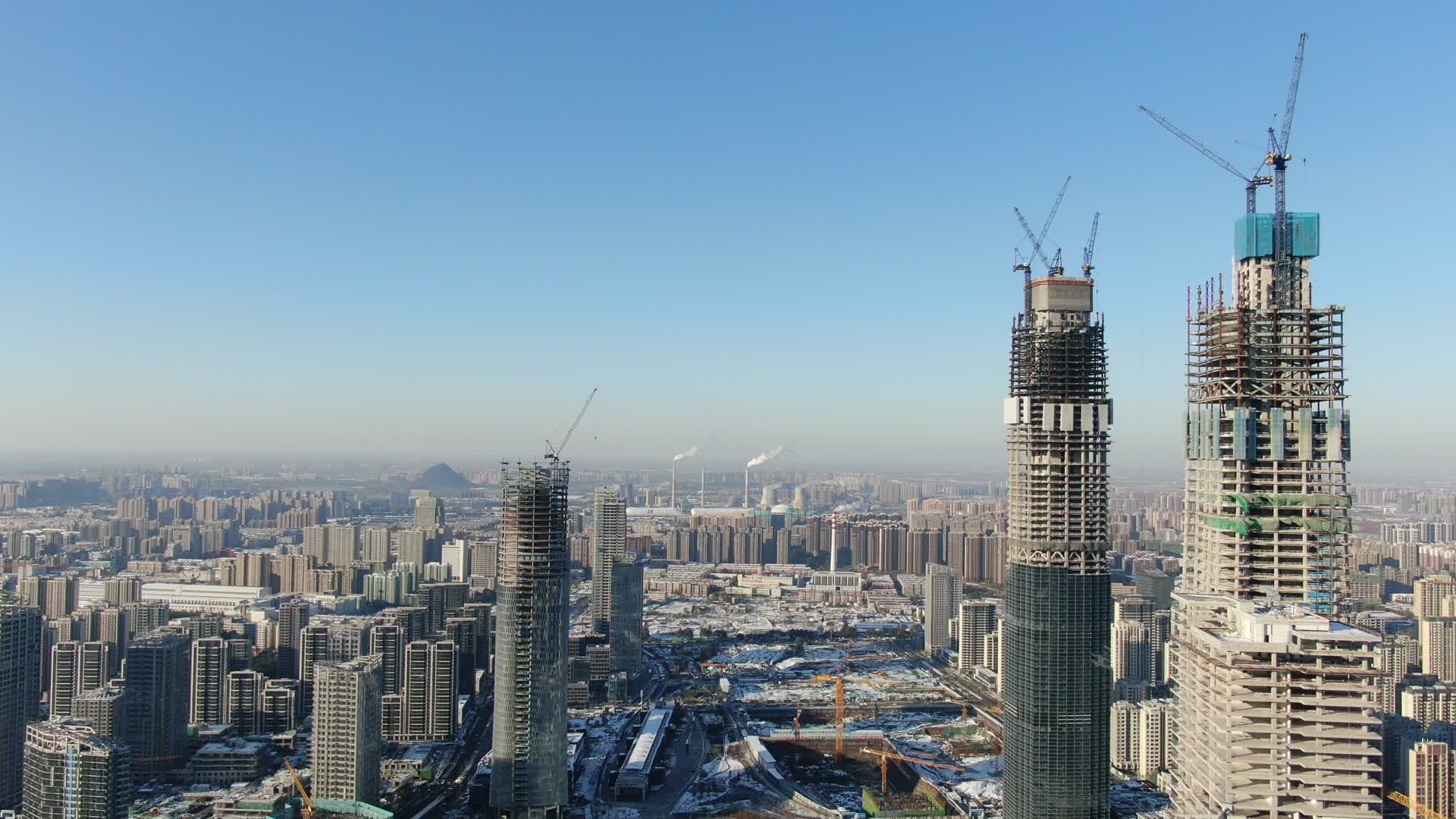 航拍山东济南城市在建商务大厦视频的预览图