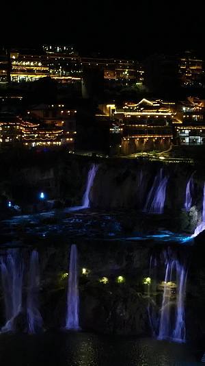 航拍湖南湘西芙蓉镇夜景竖屏视频的预览图