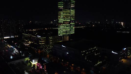 航拍贵州贵阳会展中心201大厦夜景视频的预览图