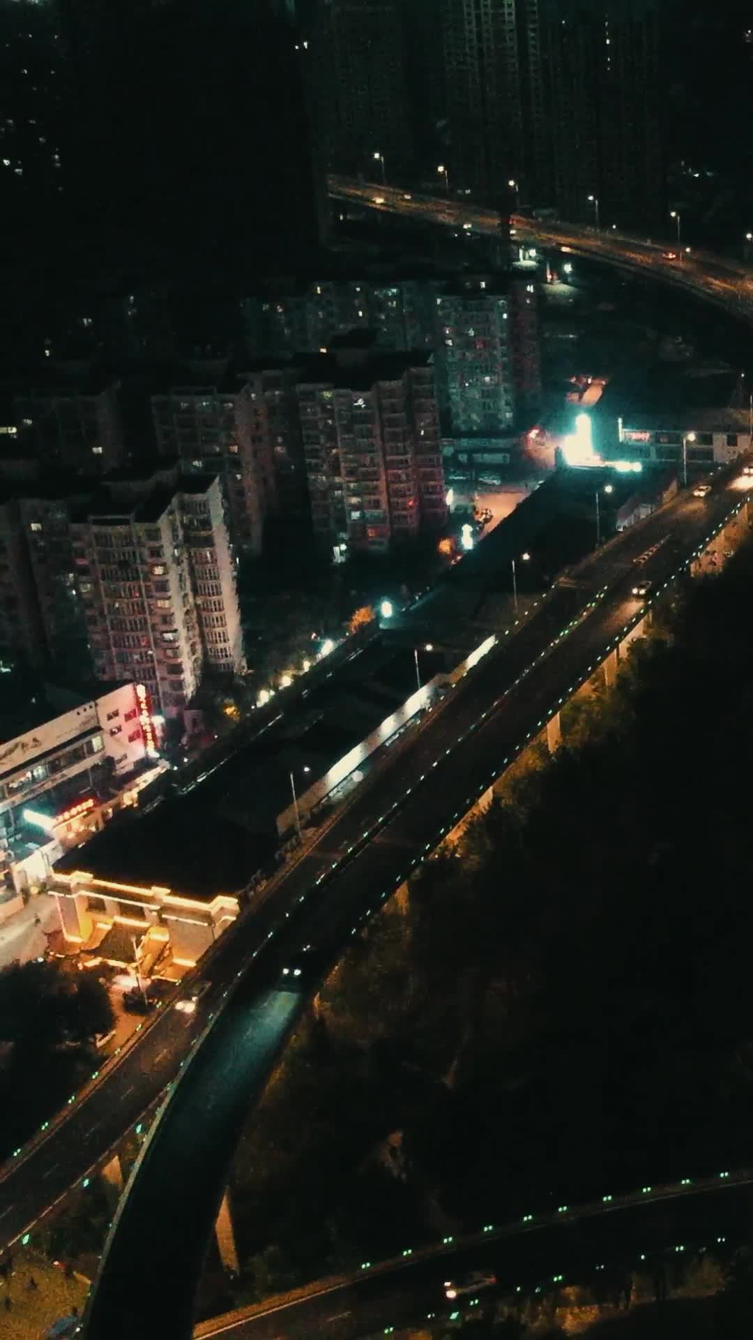 航拍城市高架立交桥夜景灯光竖屏视频的预览图
