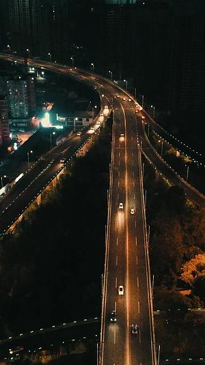 航拍城市高架立交桥夜景灯光竖屏视频的预览图