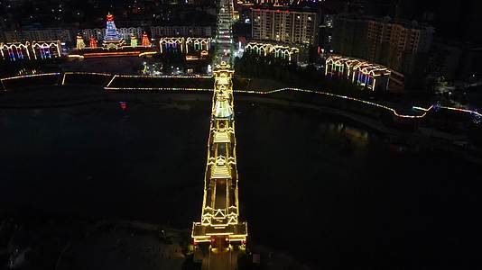 侗族特色建筑风雨桥鼓楼夜景航拍视频的预览图