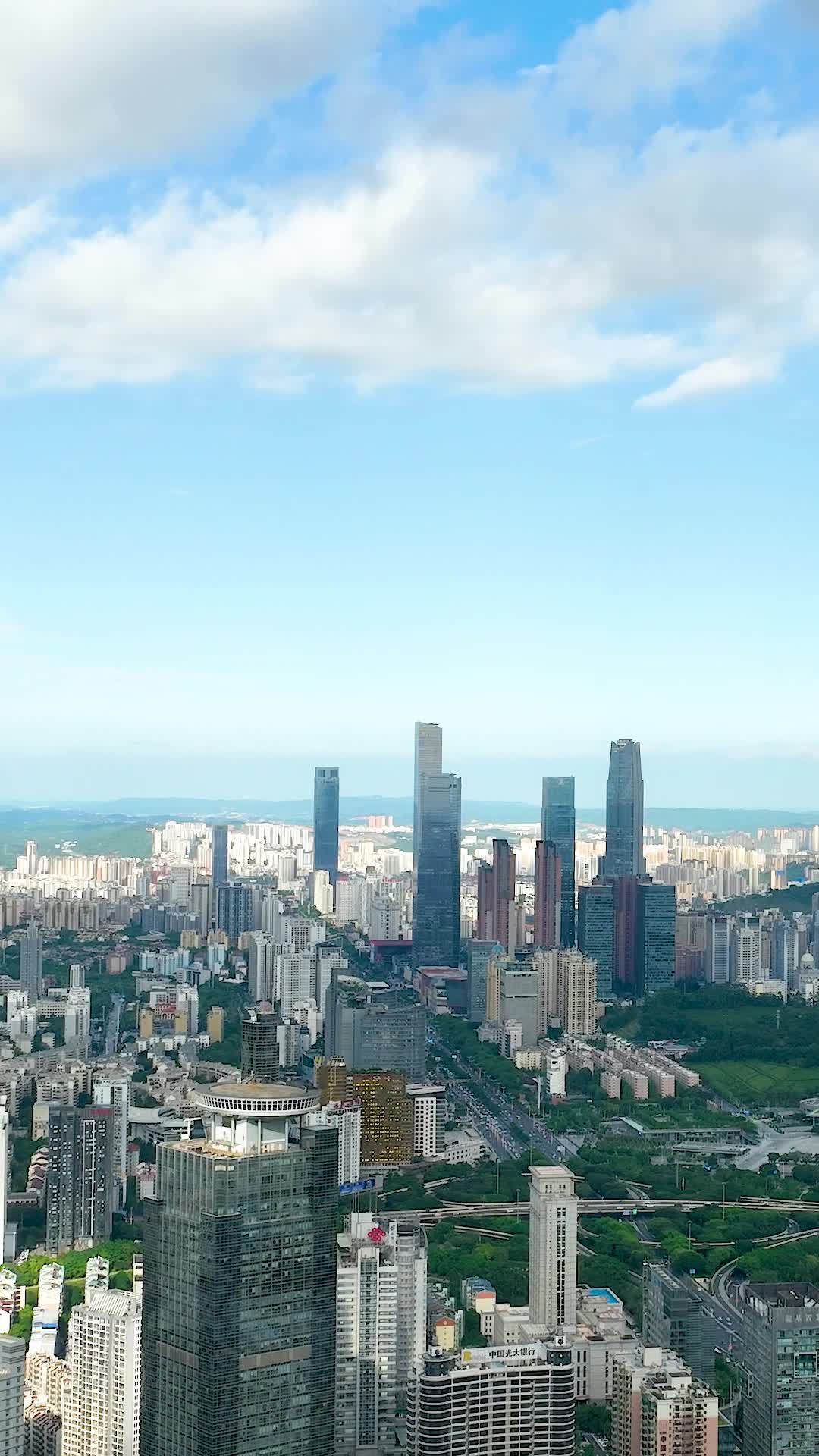 竖屏航拍南宁东盟商务区蓝天白云视频的预览图