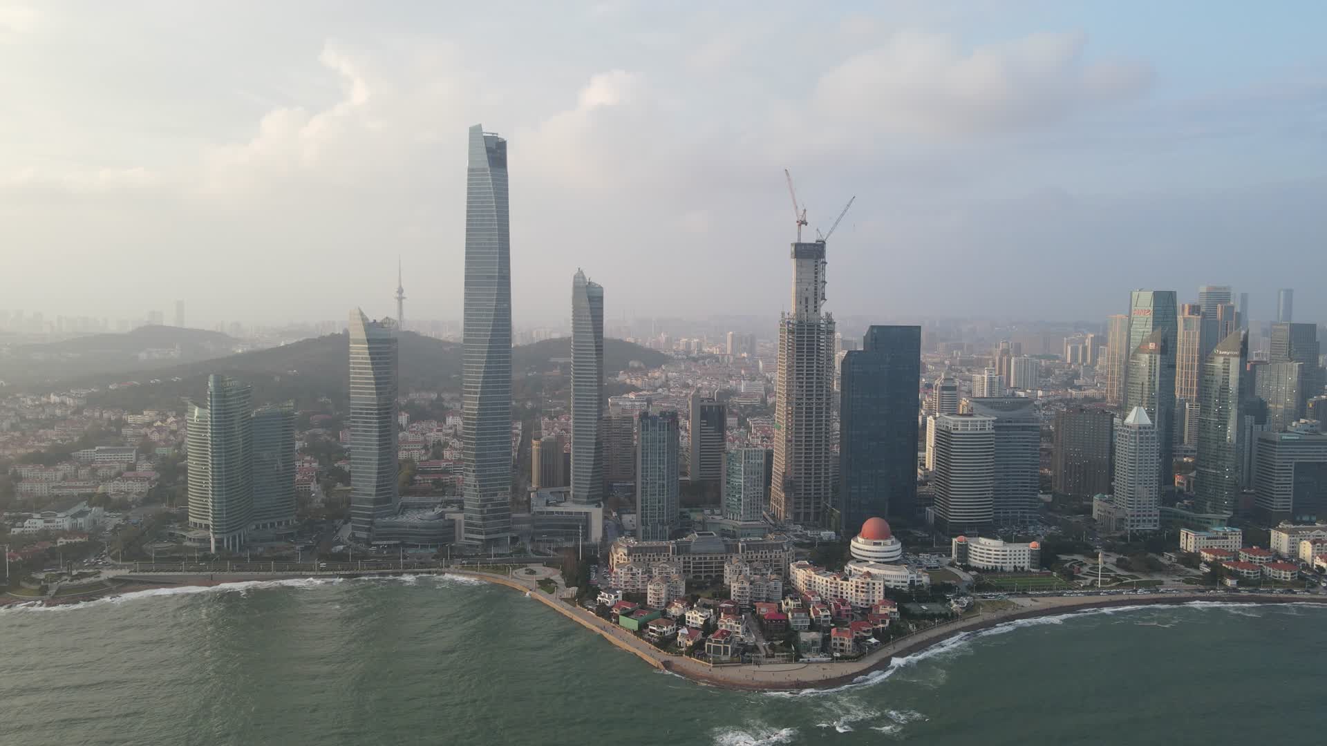 城市航拍青岛海岸线高楼建筑视频的预览图