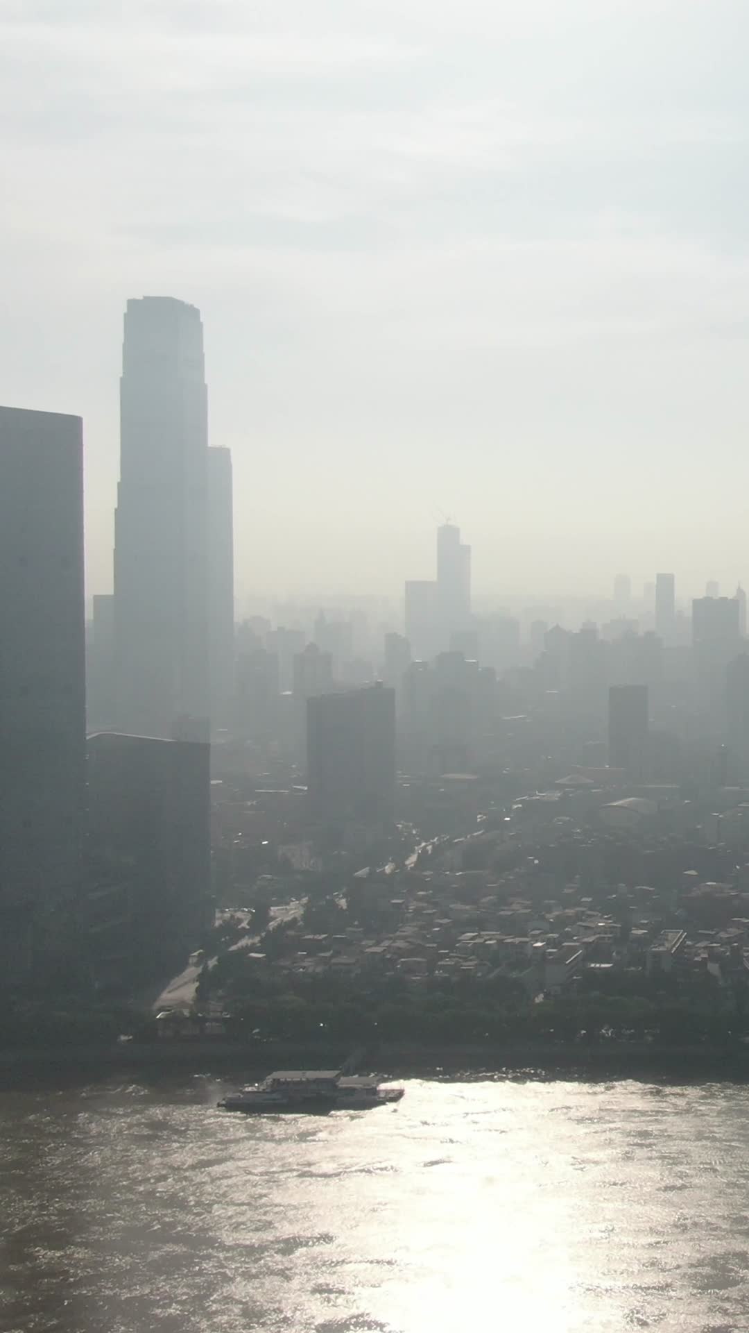 城市航拍湖南长沙清晨高楼迷雾竖屏视频的预览图