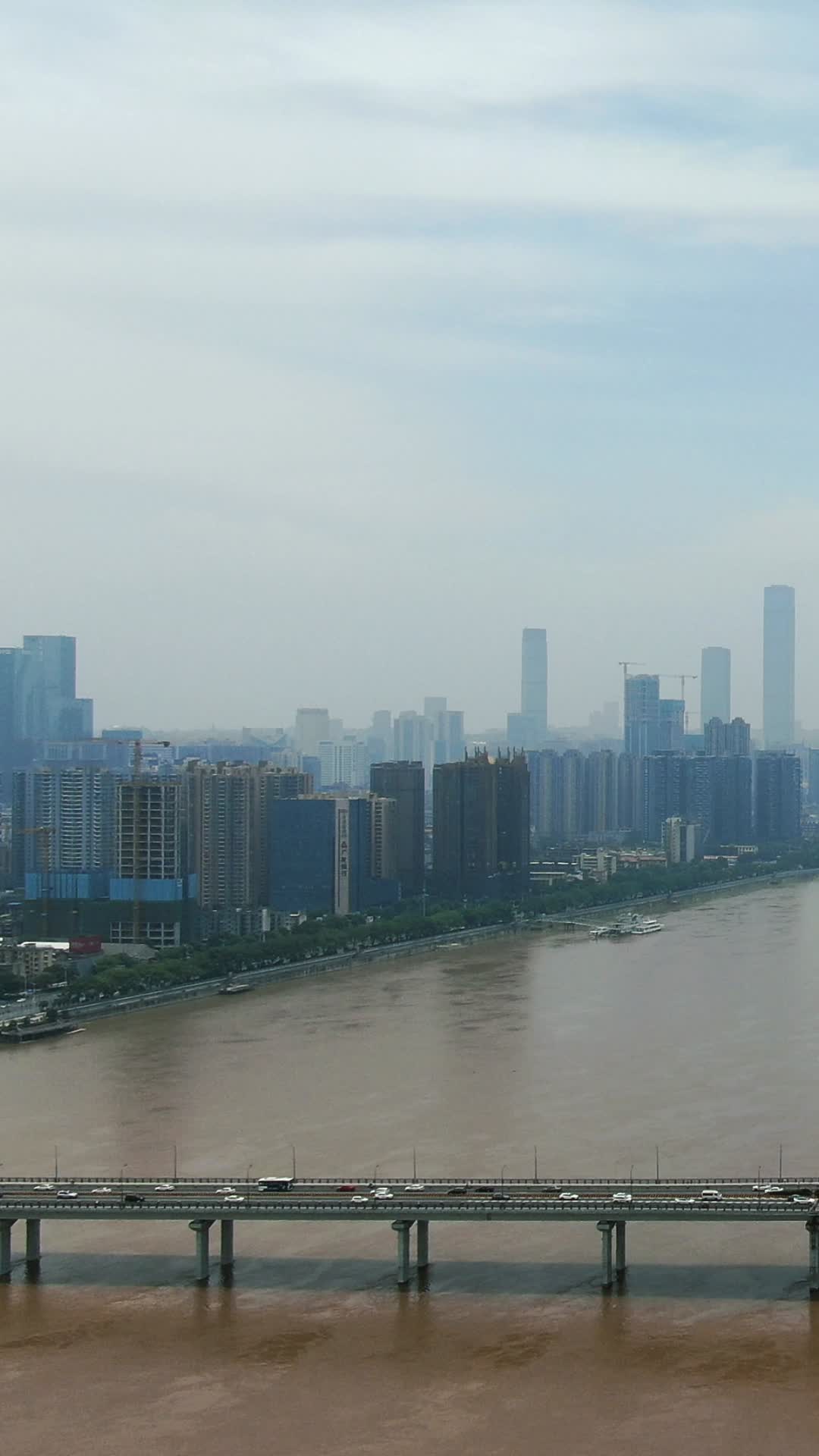 城市航拍湖南长沙湘江边高楼建筑竖屏航拍视频的预览图