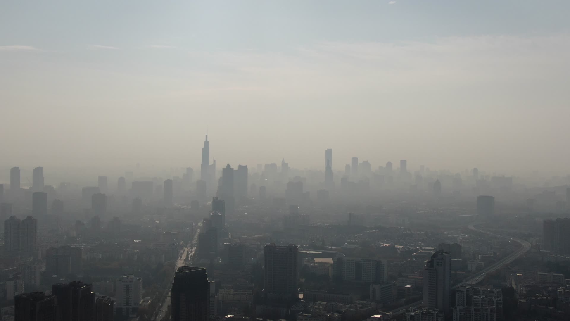 城市航拍南京清晨迷雾高楼建筑视频的预览图