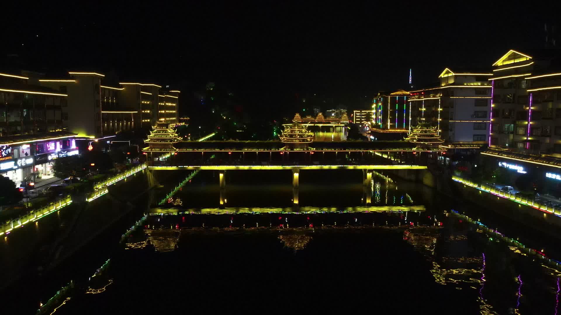 旅游景区少数民族侗族风雨桥夜景航拍视频的预览图