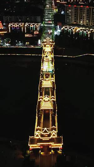 侗族特色建筑风雨桥鼓楼夜景竖屏视频的预览图