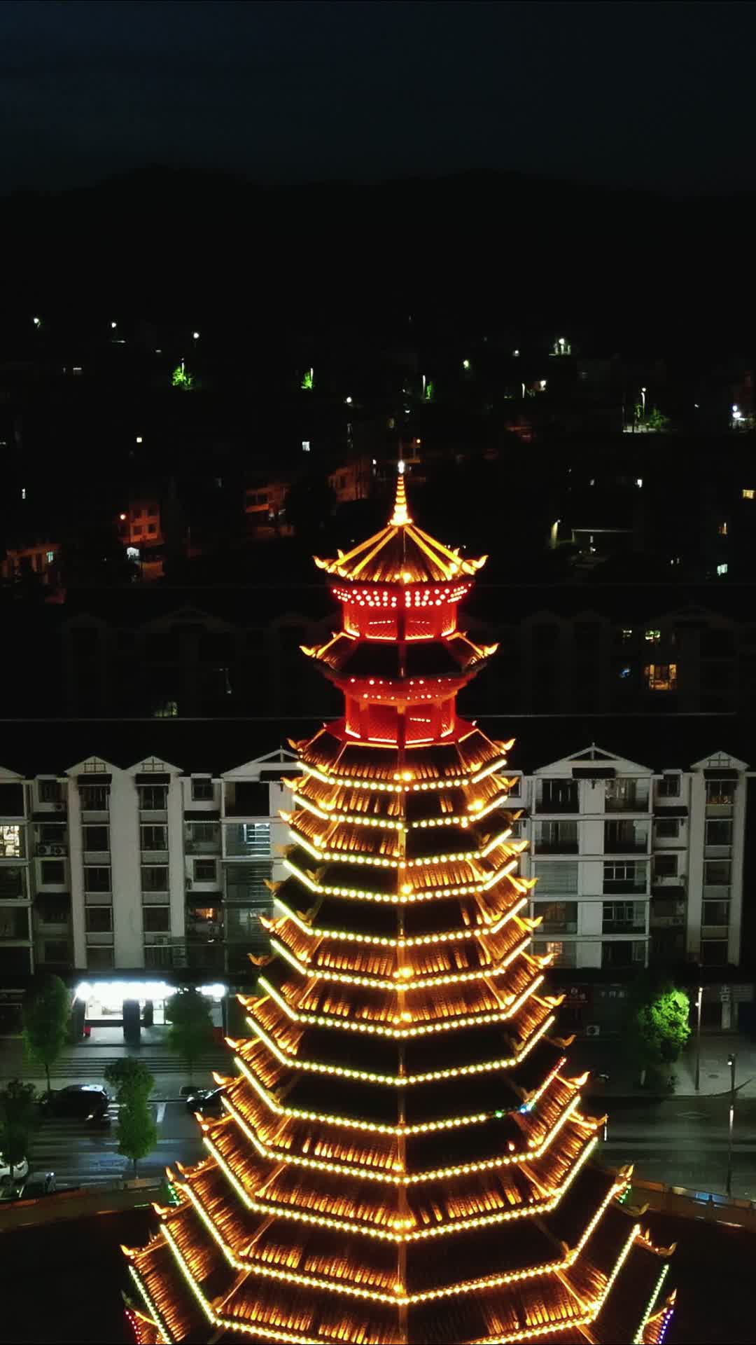 侗族特色建筑风雨桥鼓楼夜景竖屏视频的预览图