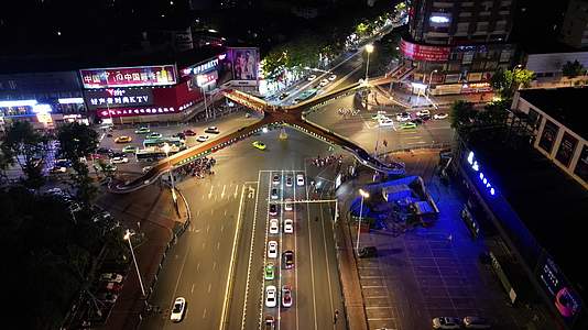 航拍湖北襄阳长征路人民广场天桥夜景视频的预览图