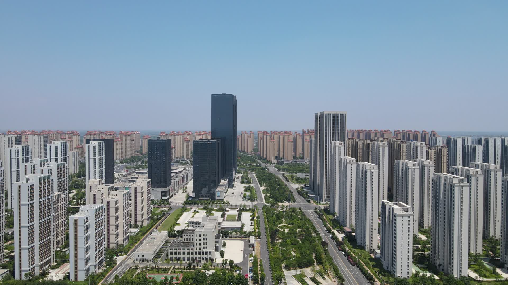 航拍湖北襄阳东津世纪城双子塔商务建筑视频的预览图