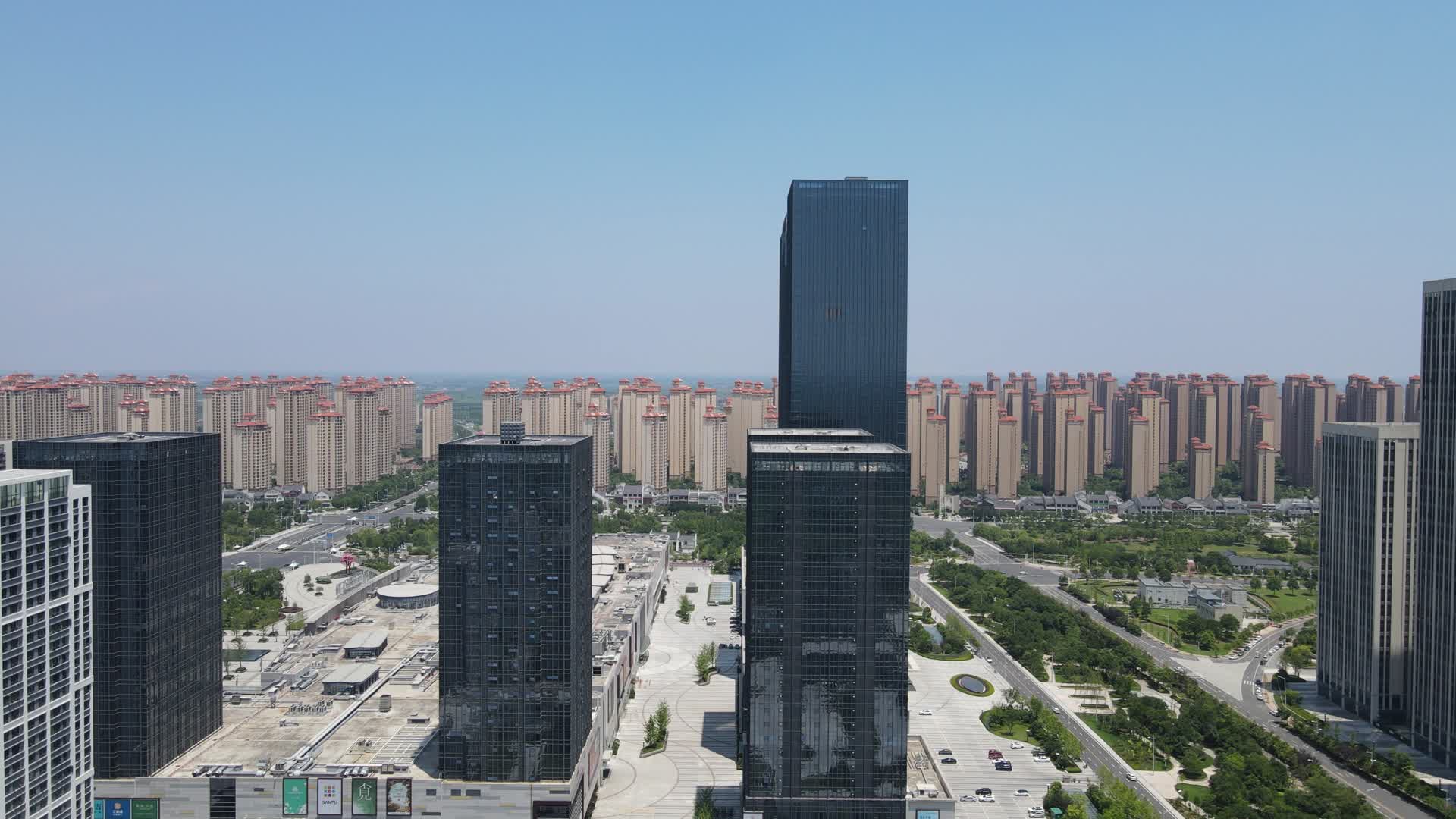 航拍湖北襄阳东津世纪城双子塔商务建筑视频的预览图