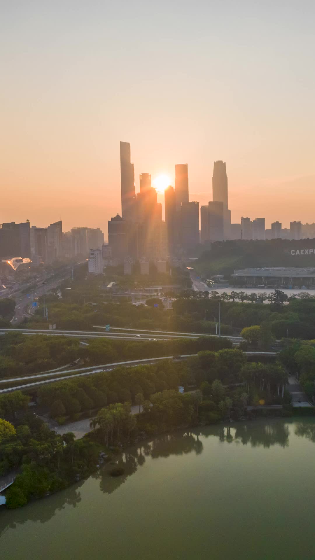 高清竖屏航拍城市夕阳景色视频的预览图