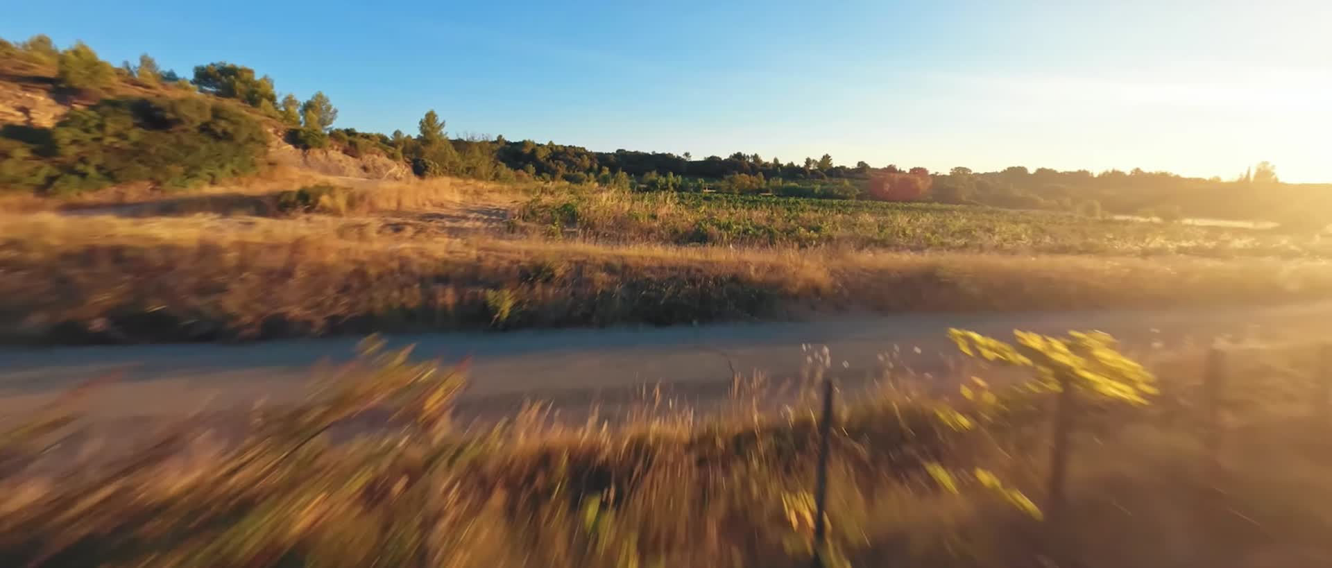 穿越机傍晚夕阳平原农田航拍视频的预览图