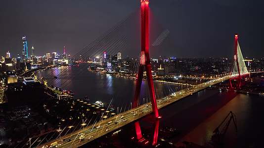 上海杨浦大桥桥梁交通日落夜景4k航拍视频的预览图